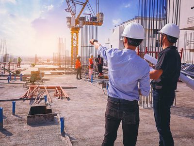 Smart,Civil,Architect,Engineer,Inspecting,And,Working,Outdoors,Structure,Building Smart civil architect engineer inspecting and working outdoors structure building site with blueprints. engineering and architecture concept.